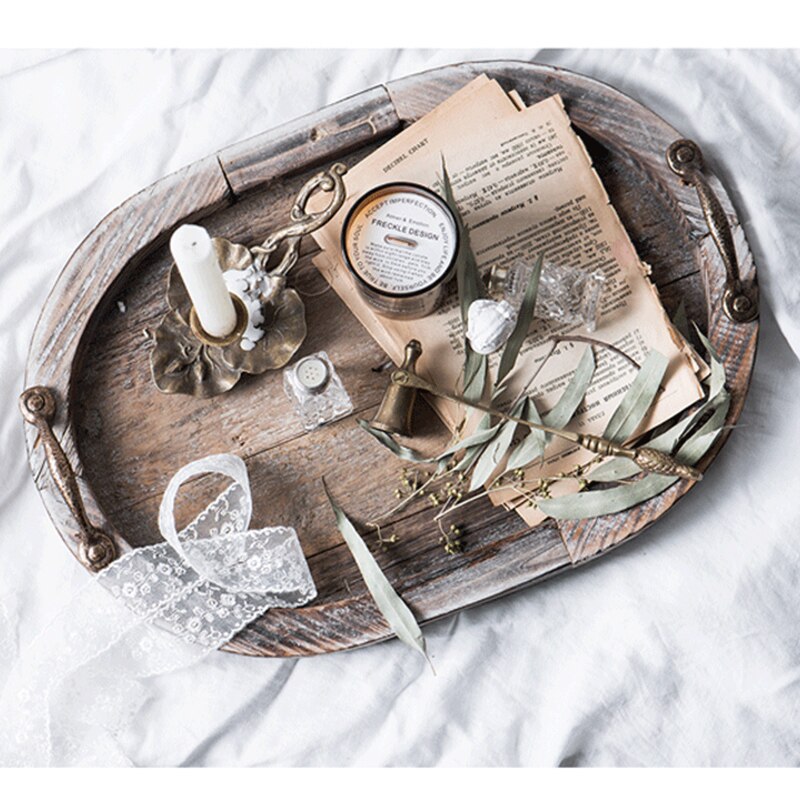 Rustic Oval Wood Tray styled with incense and candles.