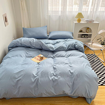 Simply Classic Duvet Cover Set 3 or 4 PC set. Easy to care for microfiber with waffle weave design on one side . Totally reversible. Shown in light blue.