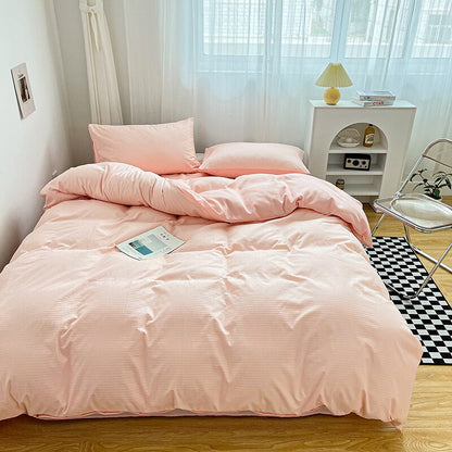 Simply Classic Duvet Cover Set 3 or 4 PC set. Easy to care for microfiber with waffle weave design on one side . Totally reversible. Shown in blush pink.
