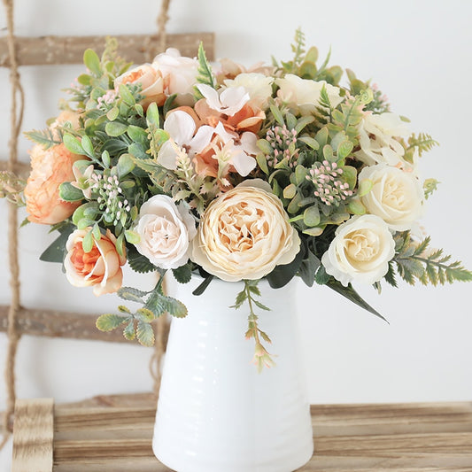 Handmade artificial silk peonies and roses in your favorite Farmhouse pitcher,  Very light peach colored blooms with greenery.