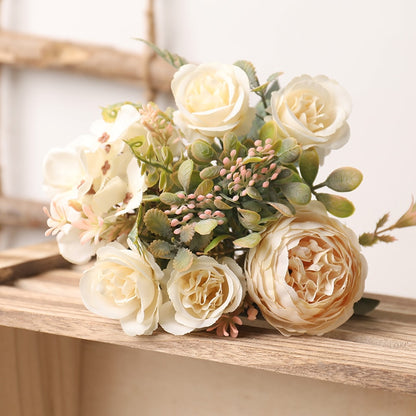 Handmade artificial silk peonies and roses bouquet.   White blooms with a light hint of peachy pink with greenery.