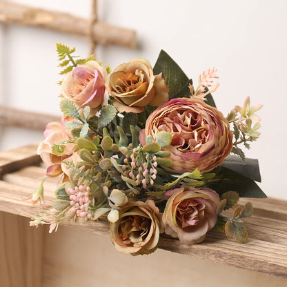 Handmade artificial silk peonies and roses bouquet.  Very light pink with hints of beige and very light gold with greenery.