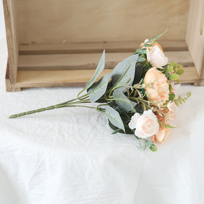 Handmade artificial peonies and roses bouquet with greenery.  Very light peach and warm white blooms .