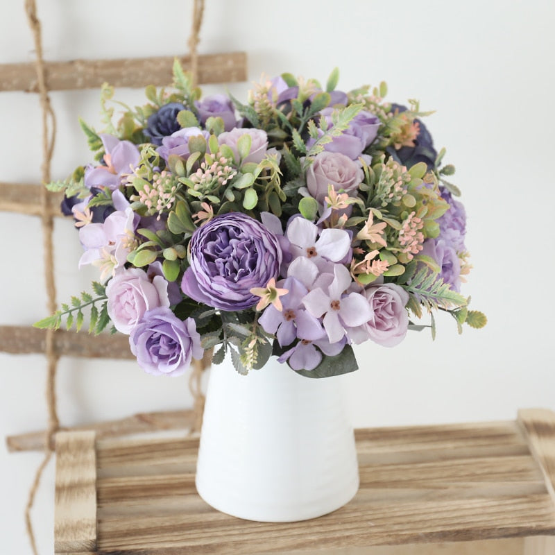 Handmade artificial silk peonies and roses bouquets.  2 bouquets fill this Farmhouse pitcher.  Very light to darker mauve blooms with greenery.