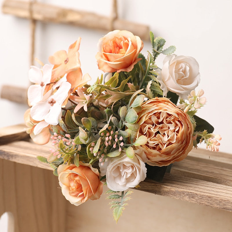 Handmade artificial silk peonies and roses bouquet.  Warm white and peach blooms with greenery.