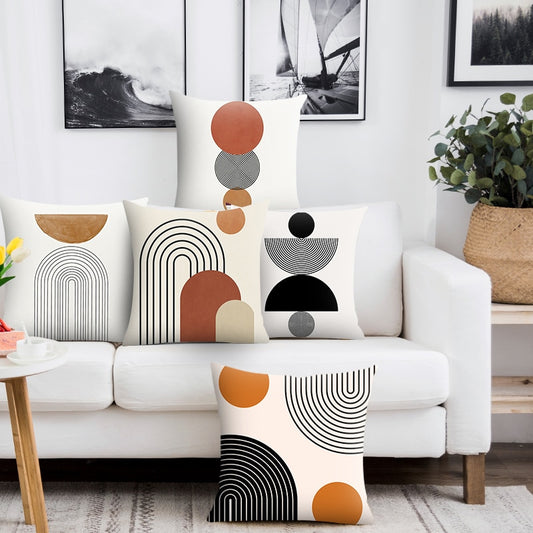 Modern Minimalist Geometric Pillow Cover.  Available in 4 sizes.  White background, orange and black geometric designs printed on one side. 