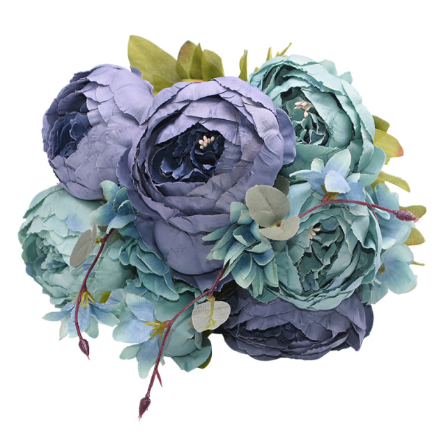 1 bunch of very soft, muted blue and a slightly darker blue European Silk Peonies complete with muted green leaves.