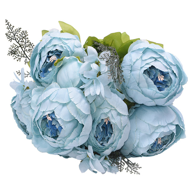 1 bunch of soft blue European Silk Peonies with a slightly darker blue center.  This bunch is completed with muted green leaves.