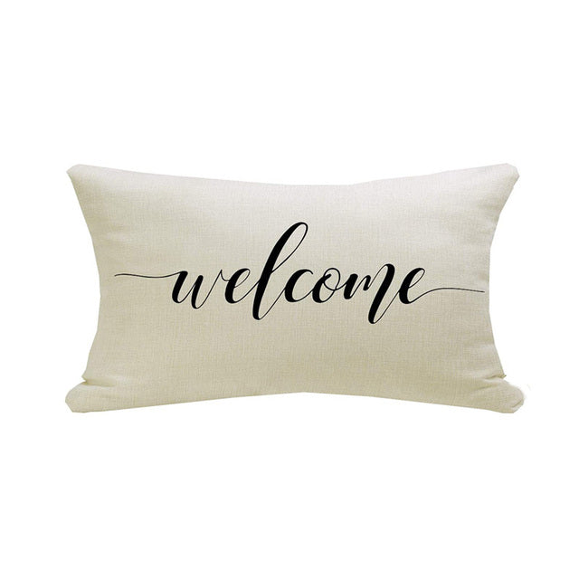 Autumn Farmhouse Pillow Cover.  Natural texture of linen look fabric depicting country charm.  Text lettering is black with a brushed lettering font on a warm white background. "Welcome".