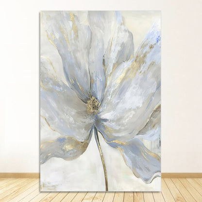 Large blue gray flower with muted grayish white background.  Flower has hints of gold added to the petals.