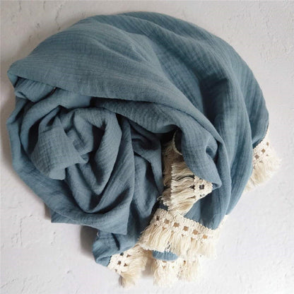 Bamboo and Cotton Muslin Baby Swaddle Blanket.  Soft, muted blue/gray with fringed edging in warm beige color.  2 sizes available 47"X40" and 31"X25".